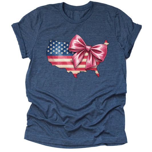 A casual short sleeve unisex T-shirt in navy, featuring a silhouette of the United States filled with an American flag design and a large pink bow.