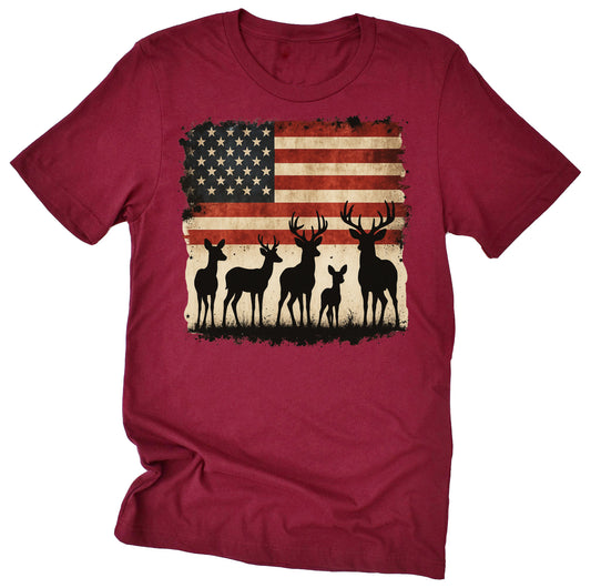 A maroon unisex T-shirt featuring a patriotic design with a deer silhouette and the American flag.