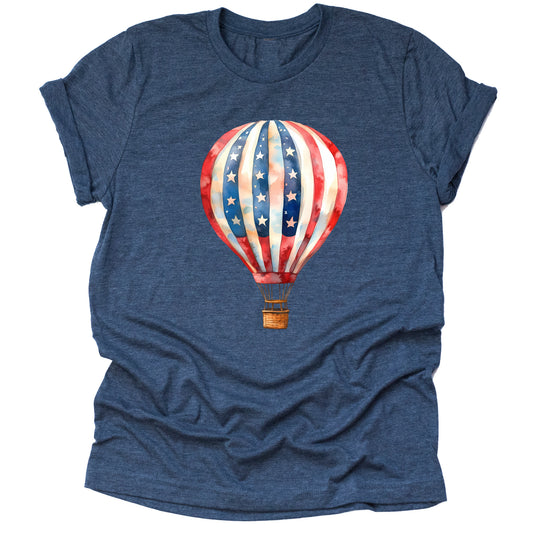 A navy unisex T-shirt featuring a vibrant graphic of a hot air balloon with a American flag theme, with stars and stripes in red, white, and blue colors.