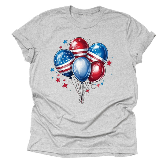 A casual short-sleeve unisex T-shirt in a grey color, featuring a design with red, white, and blue balloons adorned with stars and stripes, reminiscent of the American flag.