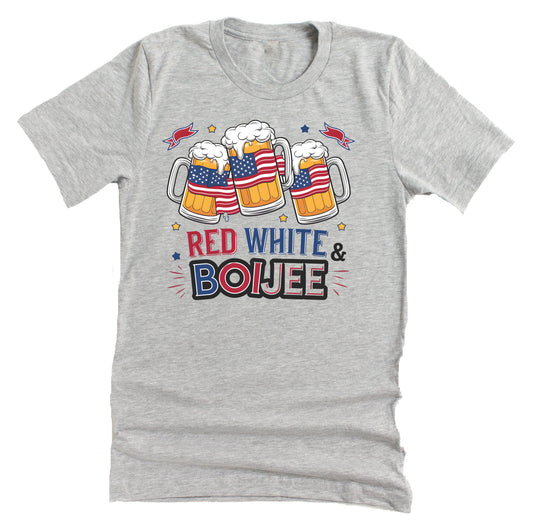 A casual short-sleeve unisex T-shirt in a light color, featuring a graphic of three beer mugs with American flag colors and the text 'RED WHITE & BOIJEE'.